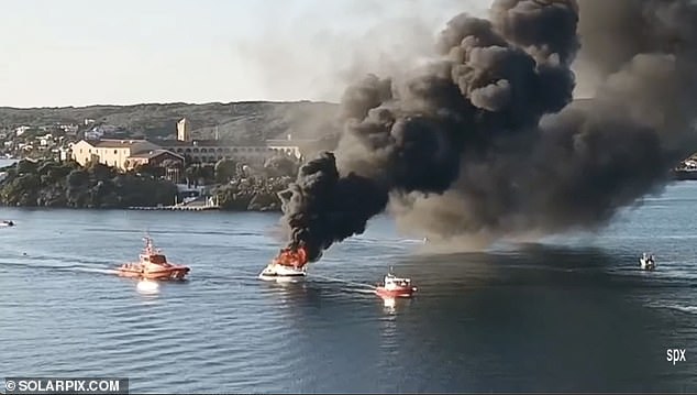 Dramatic footage showed coastguards rushing to help as they tried to extinguish the fire with high-pressure water jets as a huge plume of black smoke rose into the air.