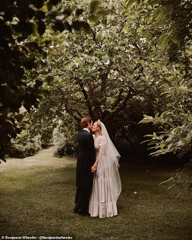 Princess Beatrice's husband Edoardo shared a never-before-seen photo of them kissing at their wedding to mark their anniversary this year