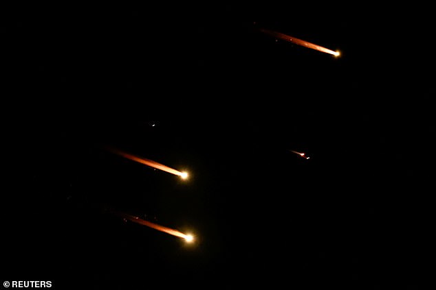 Rockets fly in the sky above Tel Aviv