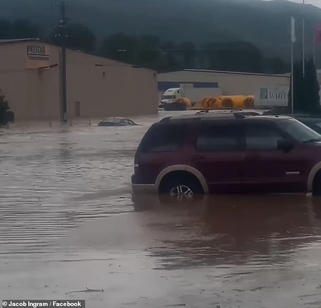 When the flooding started, managers told workers to move their cars but wouldn't let them leave, an employee said