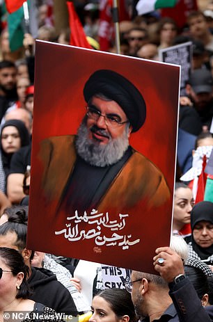 The airstrike and Nasrallah's death sparked protests across Sydney and Melbourne, with Hezbollah flags and signs in support of the slain leader (pictured)