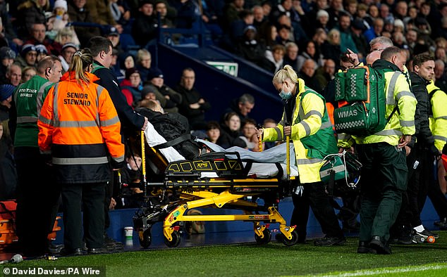 The Hawthorns descended into worried silence as medics tended to Smith