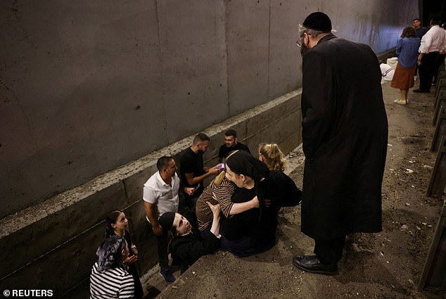 Men, women and children took shelter as air raid sirens sounded throughout Israel