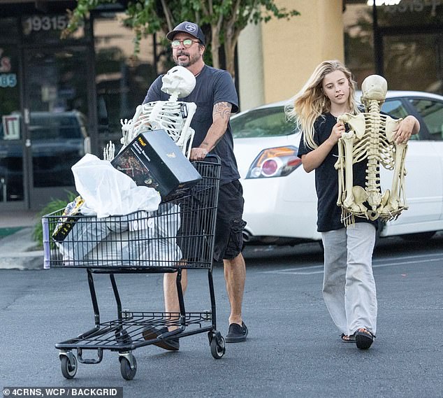 The Foo Fighters frontman was spotted leaving a Spirit Halloween store in Los Angeles with his daughter Ophelia, 10, on Sunday.