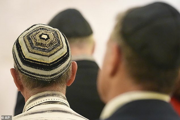 People attend a Shabbat service in Miami Beach, Florida on September 27