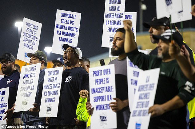 Port workers strike at Bayport Terminal in Houston on Tuesday, October 1, 2024 at midnight. (AP Photo/Annie Mulligan)