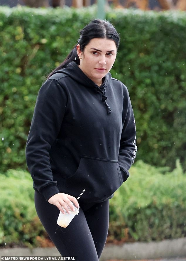 Brailey is pictured on an outing with her parents in Wollongong in August