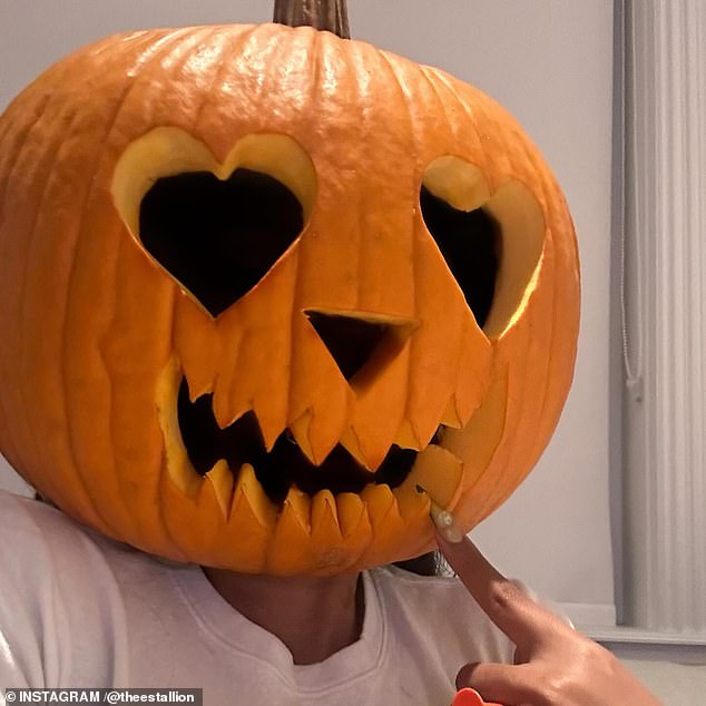 The Hiss rapper was able to strike different poses while wearing the jack-o'-lantern with heart-shaped eyes