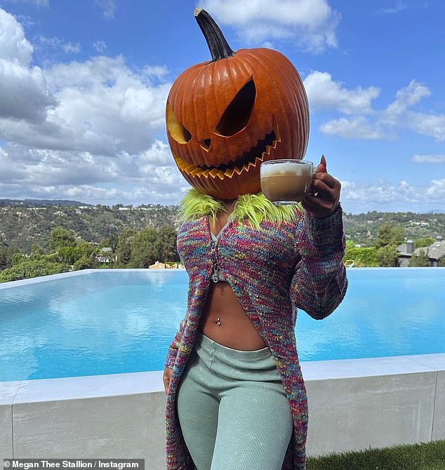 Last year, in 2023, she also posed with another carved pumpkin over her head while sipping a hot cup of coffee.