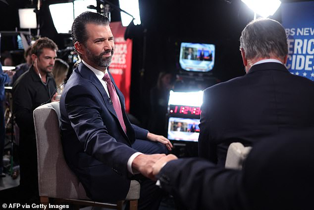 That was the point where the interview became tense. Trump Jr. then went on to blame the political climate the media created for his father's assassination. IMAGES: Donald Trump Jr. extends his hand to greet someone before an interview with a Fox News reporter in the spin room on Tuesday night