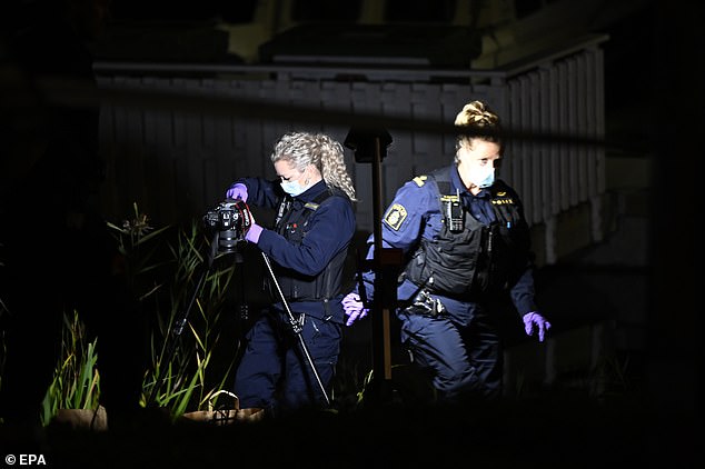 Police forensics works outside the Israeli embassy in Stockholm