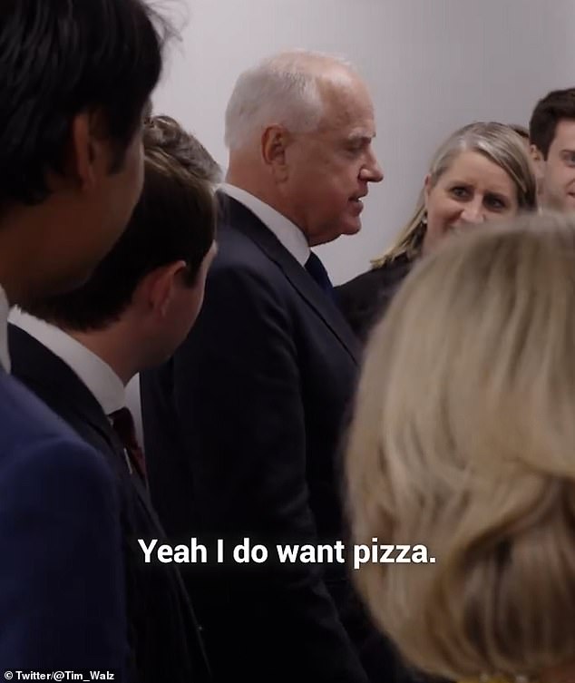 Tim Walz relaxed with a slice of New York pizza after last night's debate