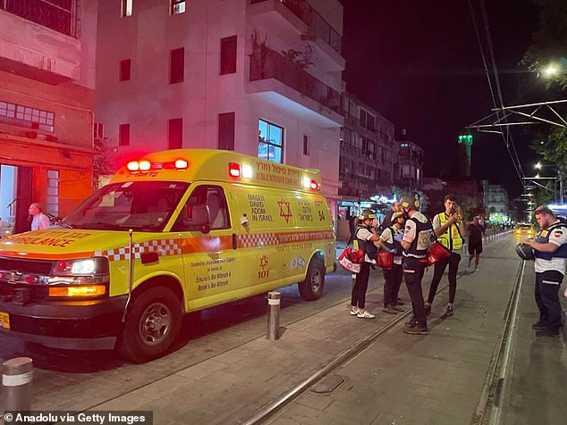 Healthcare professionals are deployed to the scene following an armed attack in Jaffa, Israel on October 1, 2024