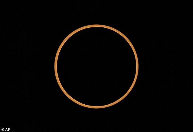 If you're lucky, the annular solar eclipse will appear as a perfectly round orange circle, like a giant hula hoop. Photo shows the annular solar eclipse from Valley of the Gods outside Bears Ears National Monument in Utah, October 14, 2023