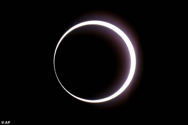 The moon passes between Earth and the sun during an annular 'ring of fire' eclipse as seen from Bryce Canyon National Park, Utah on October 14, 2023