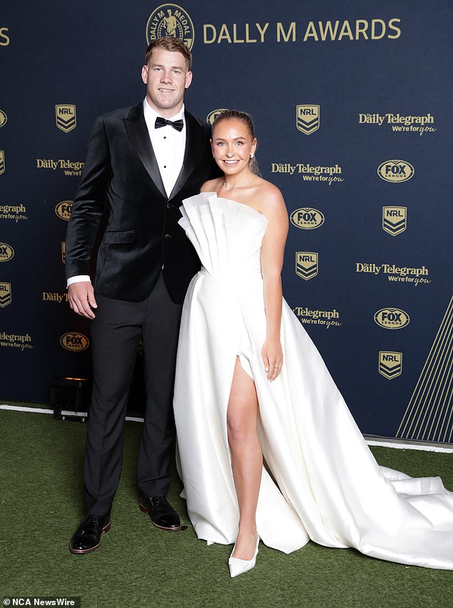 Zoe Warwick, partner of Bulldogs halfback Matt Burton, arrived in style, wearing a spectacular tight white dress with a tasteful slit at the front and strapless front with ruffles