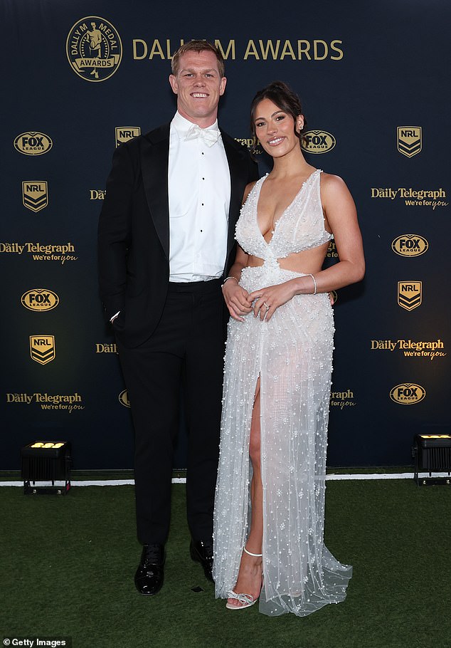 Kaylah Collins, the partner of Lindsay Collins of the Roosters, glowed in a white dress that accentuated her chest and waist. Having just welcomed a baby girl in June, the new mother was blindsided