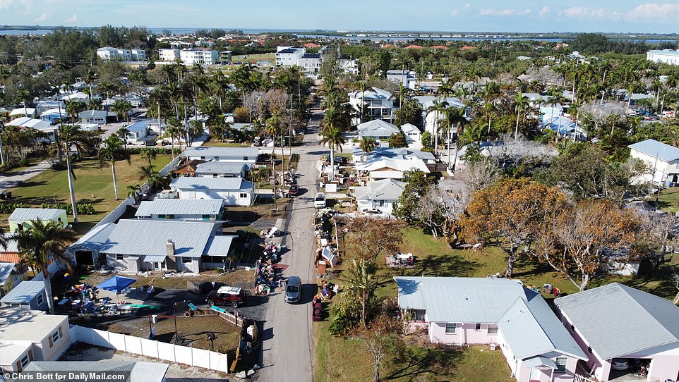 An overhead view of 124th Street showing the houses flooded by the storm, while Hunters Point lay unscathed in the distance