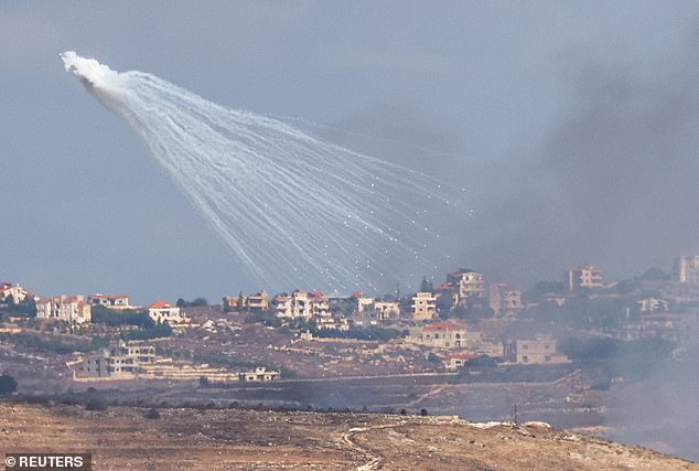 Artillery is fired by the Israeli army into Lebanon, amid cross-border hostilities between Hezbollah and Israel, seen from Jish, northern Israel, October 2, 2024