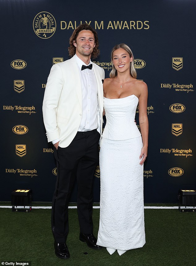 The Cronulla captain, 28, arrived with his new flame in matching white-dominated ensembles as they worked from their corners for the cameras