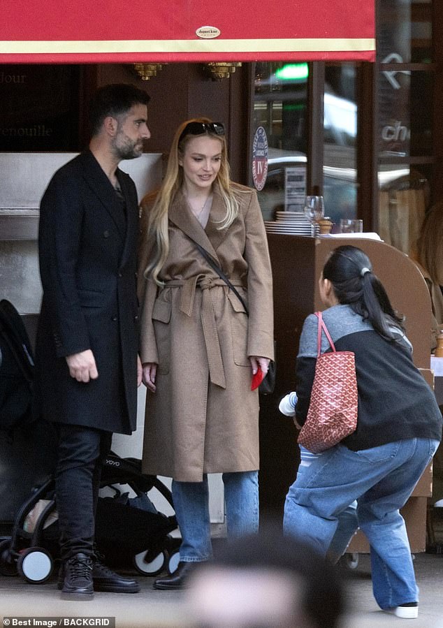 The pair were seen chatting outside the restaurant