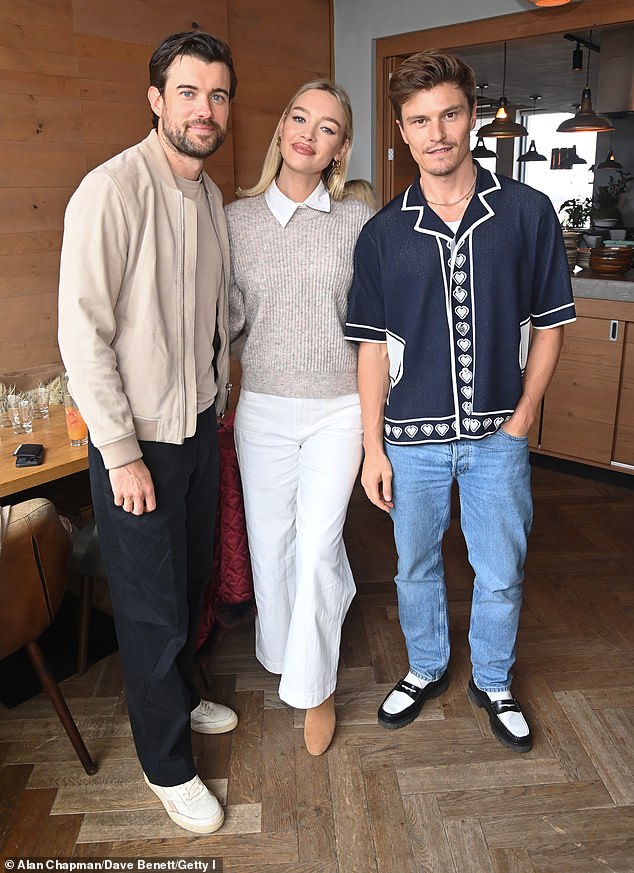 Oliver beamed next to comedian Jack and Roxy