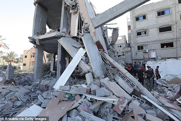 Palestinian residents scour the rubble in the Gaza Strip on Wednesday. Arab Americans drift away from Democrats during the Gaza war, despite former President Donald Trump's strong support for Israel