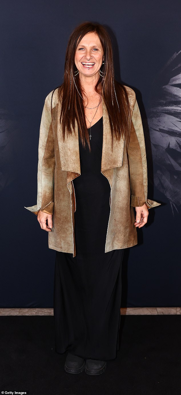 Elsewhere, iconic Australian country singer Kasey Chambers was all smiles as she arrived in a rugged brown coat