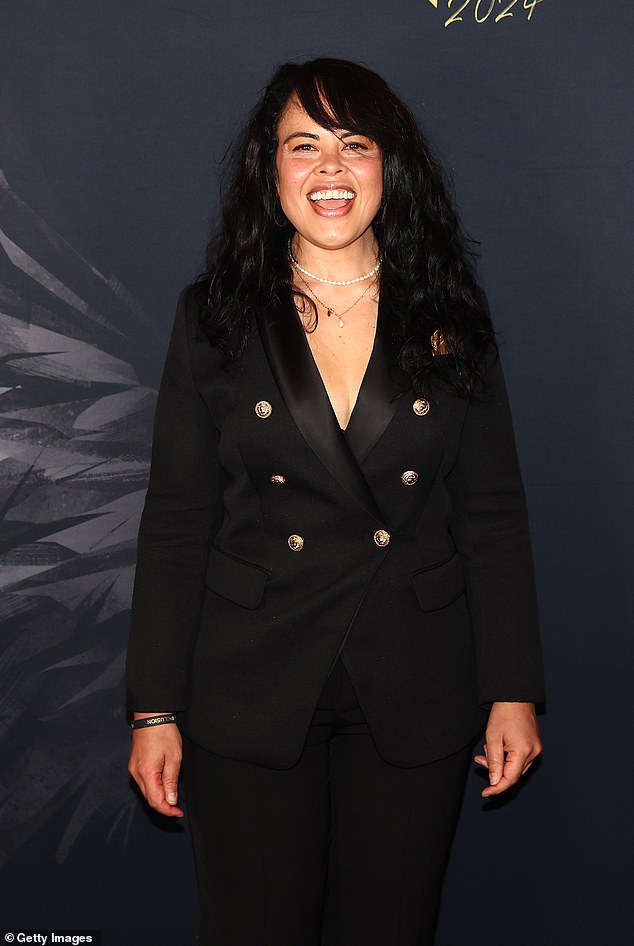 Karen Lee Andrews, 42, (pictured), previously known by her stage name Ms Murphy, opted for a smart black coat with gold buttons for the music event