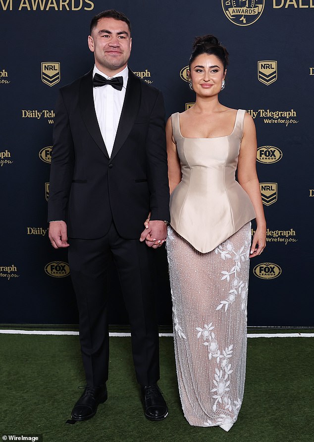 Hughes (pictured with wife Molly) became the first Kiwi half in 32 years to claim the NRL's best and fairest gong