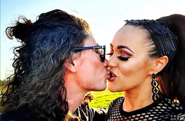 Brad also spent time growing his hair out and one photo showed Brad kissing Kylie as his long curly locks fell over his shoulders.