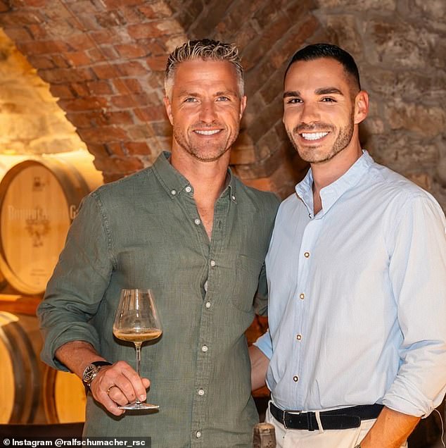 Schumacher (left) came out as gay in July together with his French manager Etienne Bousquet-Cassagne (right)