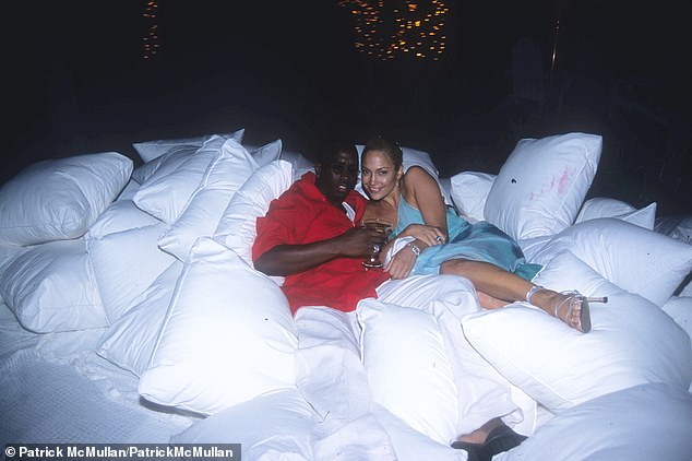 Sean 'Diddy' Combs with his then-girlfriend Jennifer Lopez at one of his infamous White Parties at his East Hampton mansion on July 2, 2000