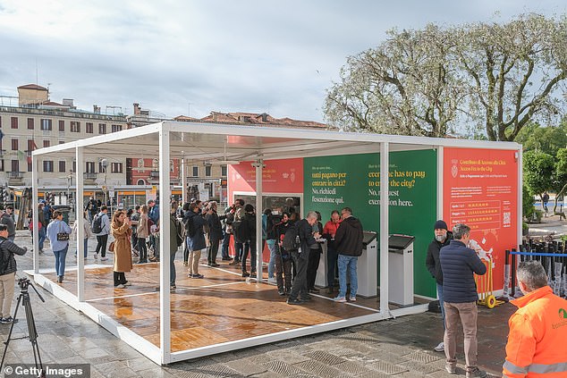 In the photo: a counter where tourists can buy a day ticket for Venice, seen on April 25