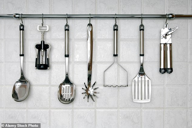 There is nothing stylish about displaying utensils (especially if they are not made of wood)