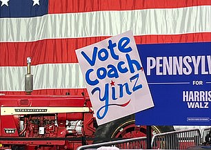 There's a tractor next to the stage at the Walz event in York County