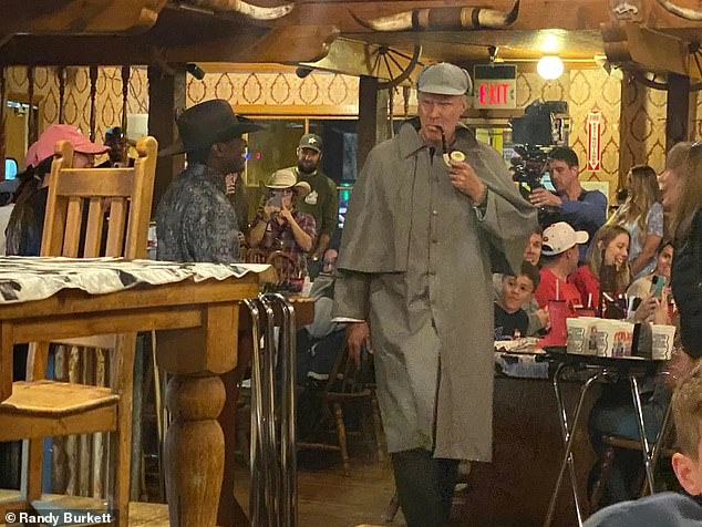 Ferrell was wearing his Sherlock Holmes costume, which only added to the madness around them