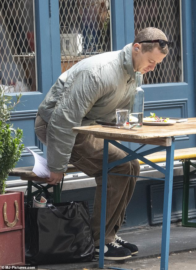 Jospeh dined outside and took a book with him for company