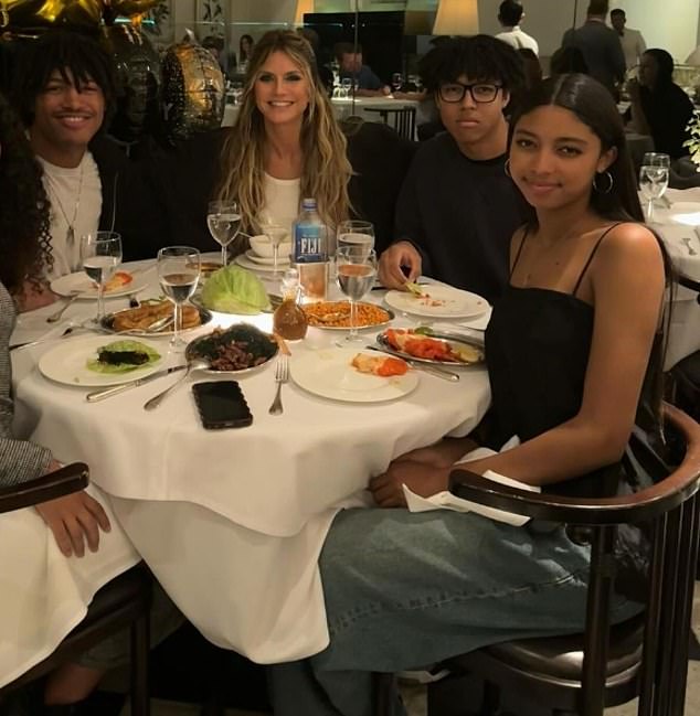 The Project Runway alum drew her inspiration for Modelverse from the years her daughter Lou, 14, played Roblox. Lou is seen on the far right with Heidi and her brothers