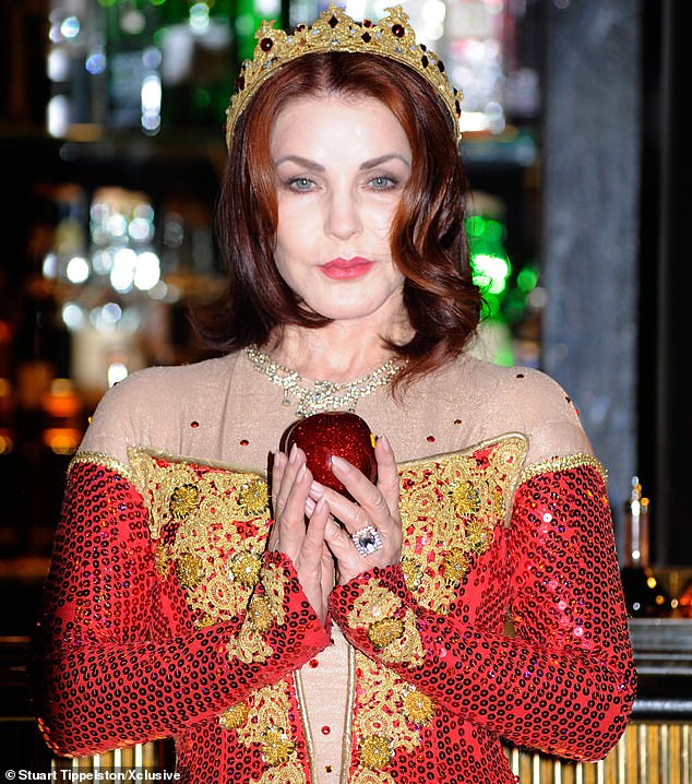 Priscilla Presley poses as the Wicked Queen during a photo call for Snow White and the Seven Dwarfs at the New Wimbledon theater in 2012