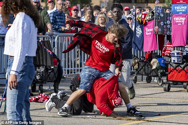 Two vendors selling Trump merchandise got into a fight before the event