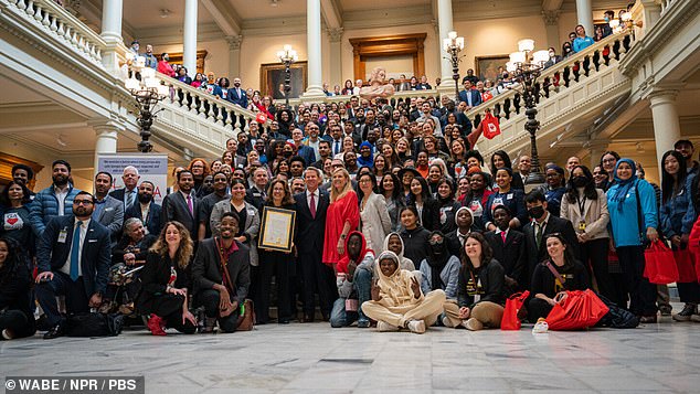 Naturalized citizens in Georgia celebrate their new citizenship. Steve Hubbard, a senior data scientist at the American Immigration Council, says new citizens are often the most eager to participate in democracy