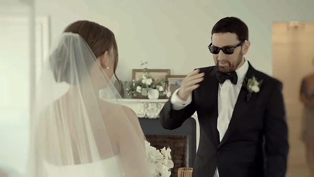 The music video featured Eminem – whose real name is Marshall Bruce Mathers III – walking into a room on his daughter's wedding day to catch a first glimpse of Hailie in a strapless, white dress and sheer veil.