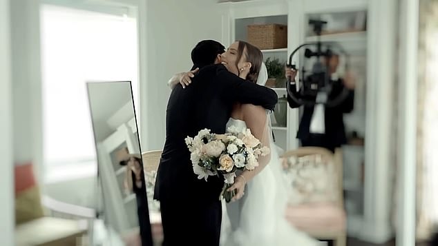 The star - who wore a classic black suit to the wedding - proudly walked up to his daughter and took off his sunglasses to give her a loving hug