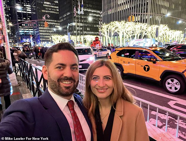 Lawler pictured here with his wife in New York City, near Radio City Music Hall