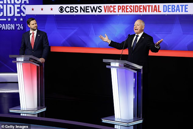 Republican vice presidential candidate Senator JD Vance (R-OH) and Democratic vice presidential candidate Minnesota Governor Tim Walz participate in a debate at the CBS Broadcast Center