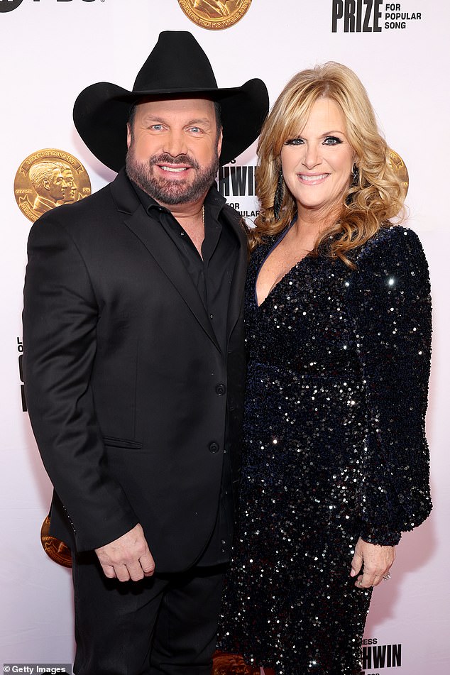 He was accused of sexual assault and battery in a complaint filed Thursday in a California state court by a makeup artist who worked for his wife Trisha Yearwood; seen with Trisha in March