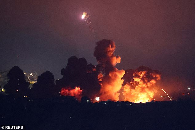 Smoke rises after an explosion over Beirut's southern suburbs following a strike on October 3