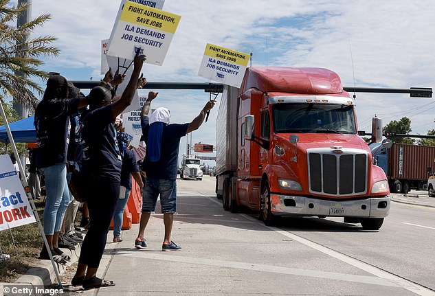 The strike began Tuesday over wage disputes and the automation of gates, cranes and trucks used to move containers at 36 ports from Texas to Maine.