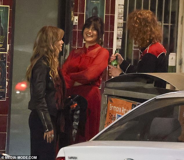 It seems the rock star lifestyle is rubbing off on Mia, with the young singer recently seen smoking cigarettes while hanging out with friends in Sydney's Rose Bay.